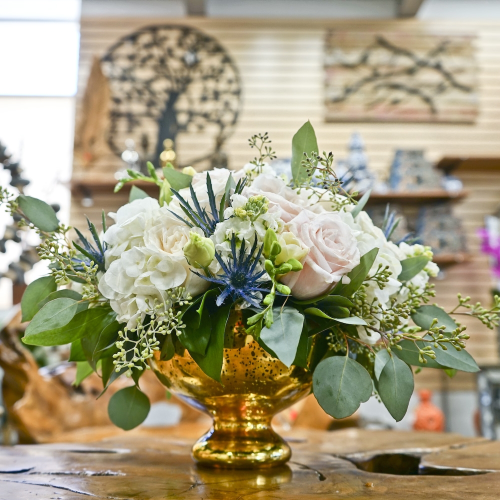 This gold mercury glass pedestal compote bowl vase is made of heavy thick glass in the sparkling gold finish.